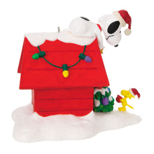 Load image into Gallery viewer, The Peanuts® Gang Deck the Doghouse Musical Ornament With Light
