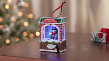 Load and play video in Gallery viewer, Rockin&#39; Window Shopping 2025 Musical Ornament With Light and Motion

